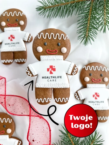 ręcznie zdobiony, duży piernik świąteczny w kształcie piernikowego ludzika z personalizowanym logo jako upominki i prezenty świąteczne dla firm